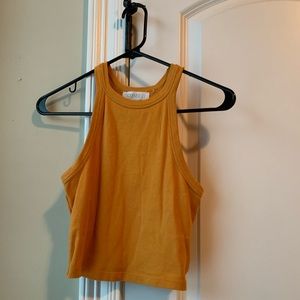 Mustard yellow crop top.